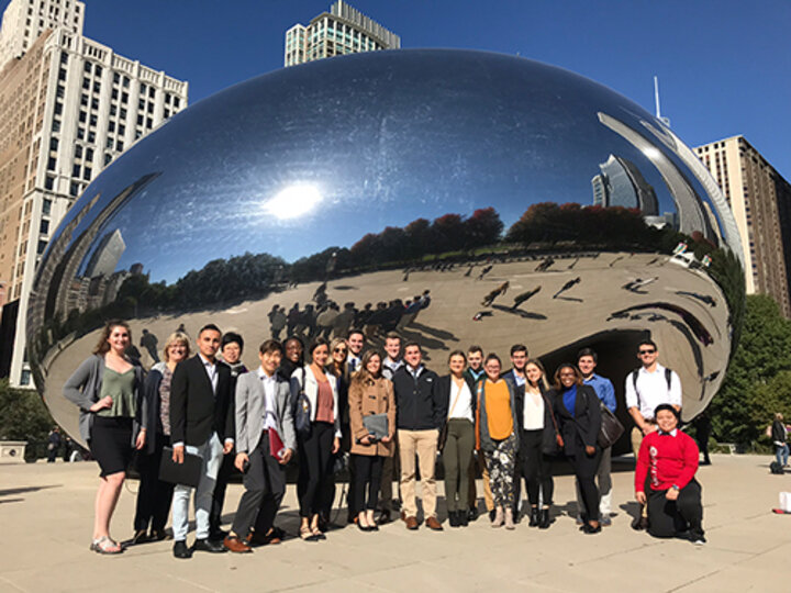 The 19 Nebraska Business students who went on the expedition took a moment to admire Cloud Gate at Millennium Park.