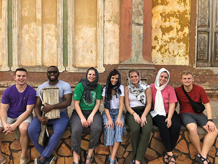 The group from Nebraska waits outside a mosque in Porto-Novo, Benin.