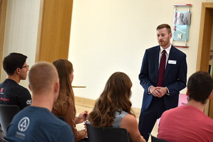 Logan Ohs, an audit manager at RSM US, talks to students about geographic opportunities.