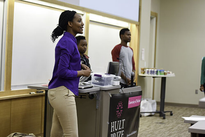 Alexis Hakizimana presents her plan on a more efficient way to provide clothing to impoverished areas of Rwanda.