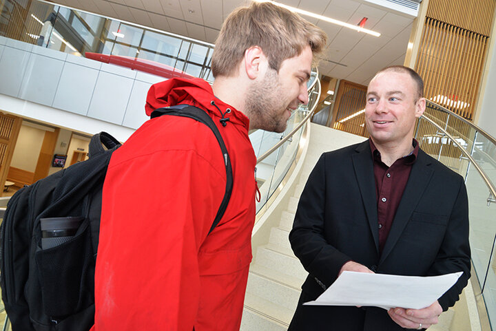 Jimmy Downes with a student