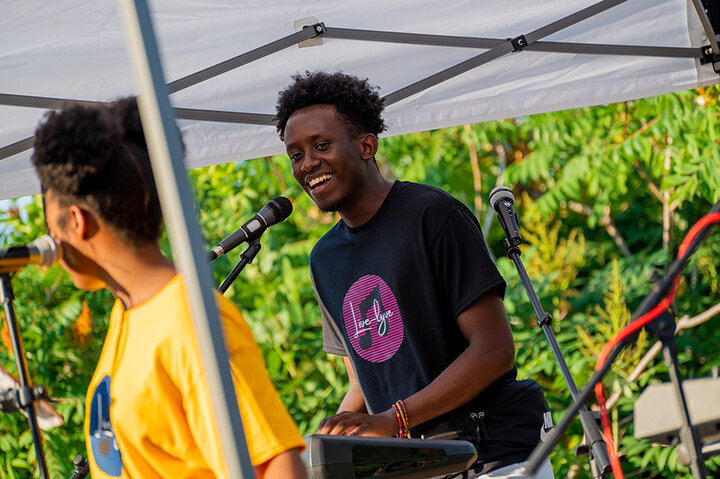 Japhet Ingeri, junior integrated science major, served as a teaching assistant for the virtual course. As a member of the Live Lyve Band, he played keyboard and sang vocals at the concert.